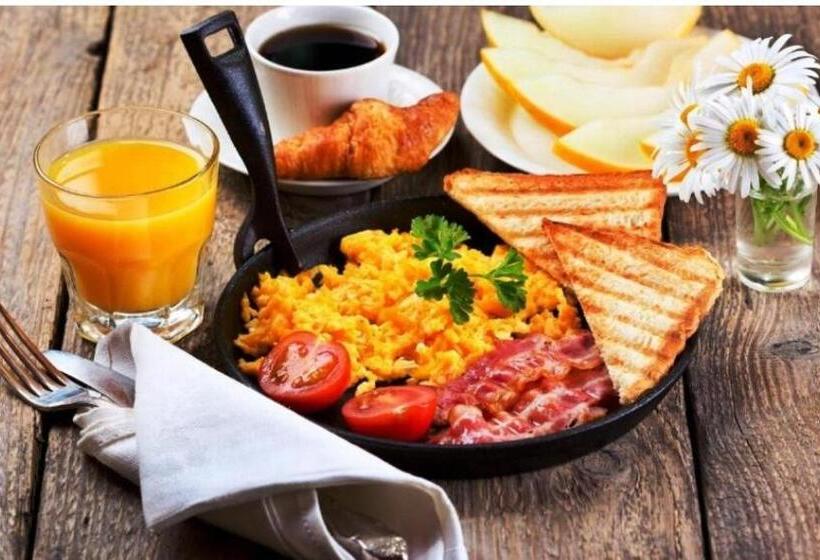 Отель Leela Grand Inn