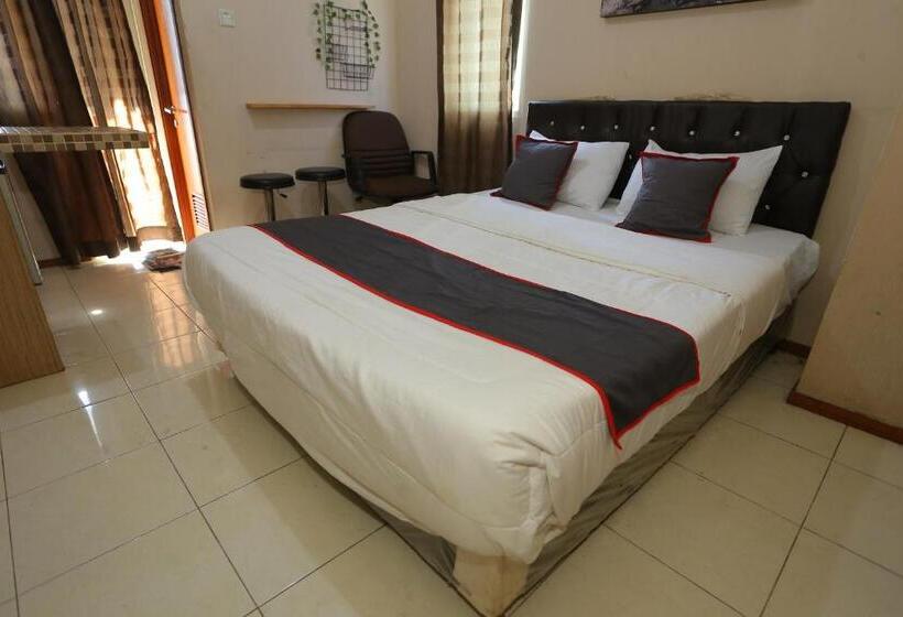 호텔 Capital O 93372 Aurora Residence