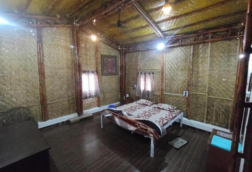 בית מלון כפרי Vasant Bamboo Cottage