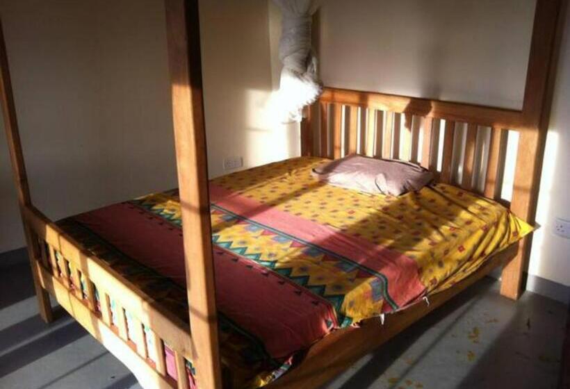 تختخواب و صبحانه Wild West Guesthouse Masaka