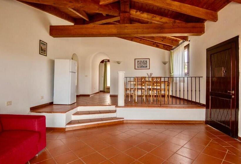 Villas With Air Conditioning And Shared Pool, Just A Few Minutes From La Pelosa Beach