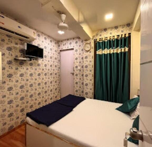 ホテル Nice Inn Ahmedabad