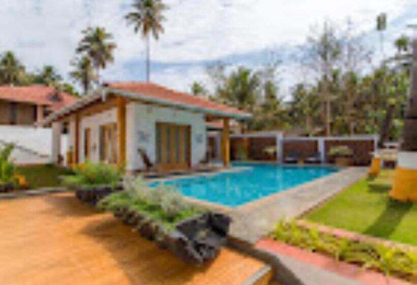 אתר נופש Hideout Cottage 878, Kudal