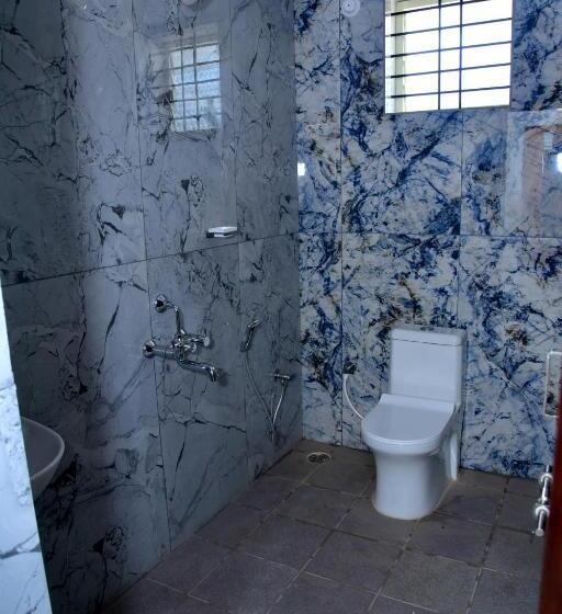 בית מלון כפרי Sharada Inn