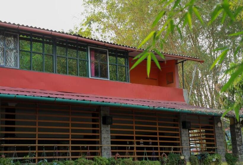 호텔 Edakkal Home Stay