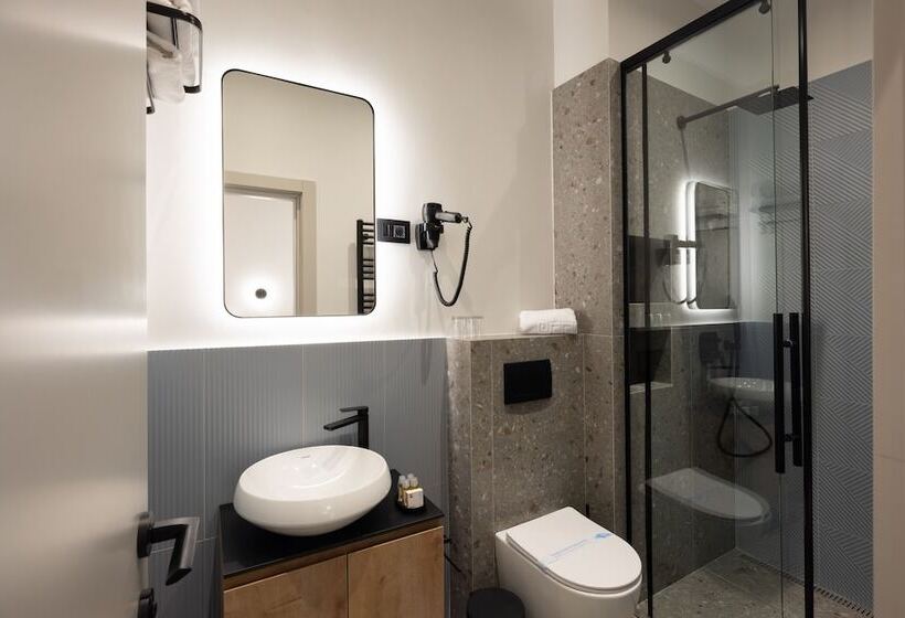 פנסיון Hop Inn Rooms & Suites