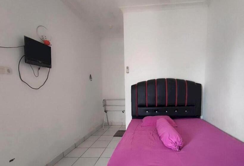 Отель Oyo 93252 Garuda Bandara Guesthouse