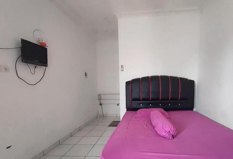 Отель Oyo 93252 Garuda Bandara Guesthouse