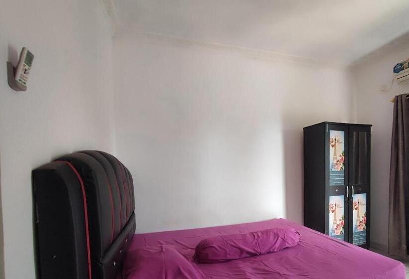 Отель Oyo 93252 Garuda Bandara Guesthouse