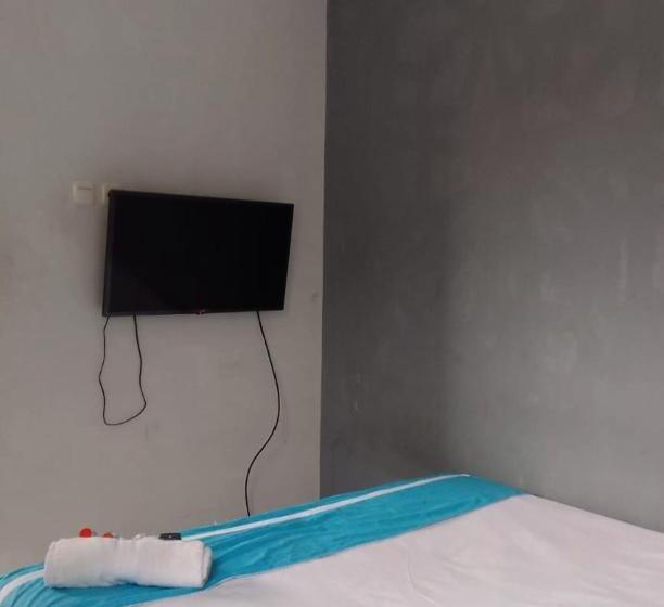 호텔 Oyo 93286 Yellow House Syariah