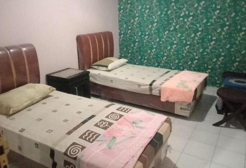 فندق Oyo 93292 Raudhatul Husna Homestay Syariah