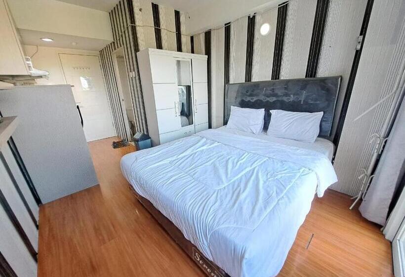 Отель Oyo Life 93106 Apartement Grand Sentraland By Andi