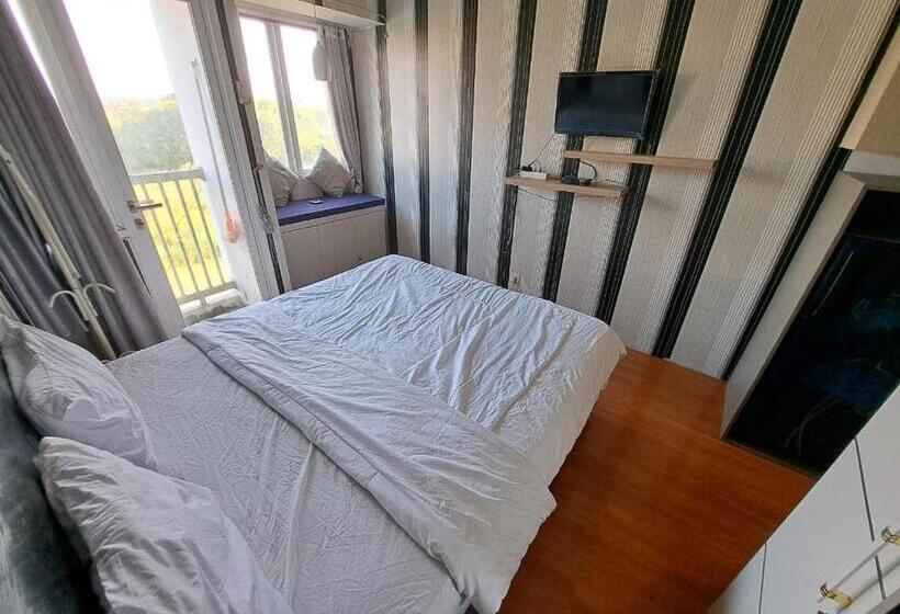 Отель Oyo Life 93106 Apartement Grand Sentraland By Andi