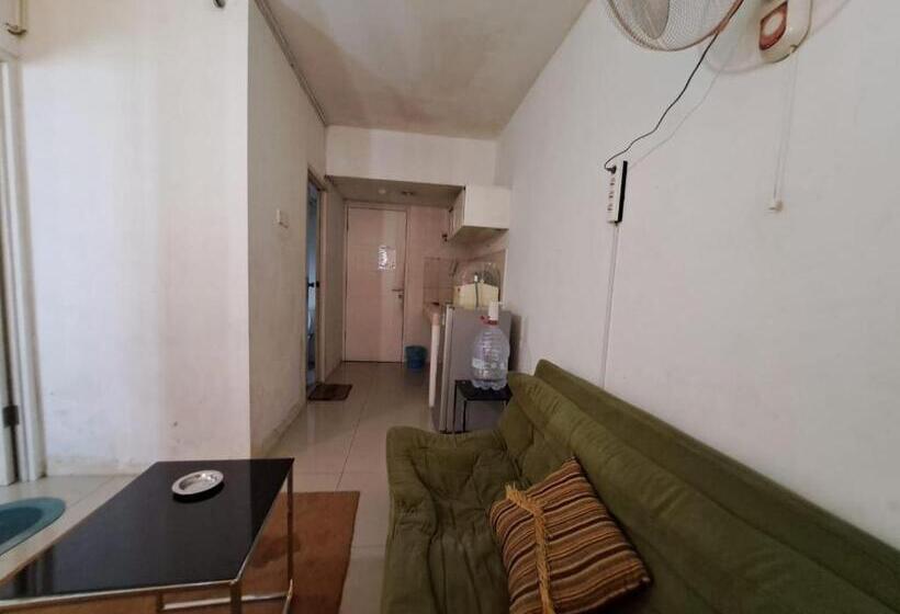 Отель Oyo Life 93106 Apartement Grand Sentraland By Andi