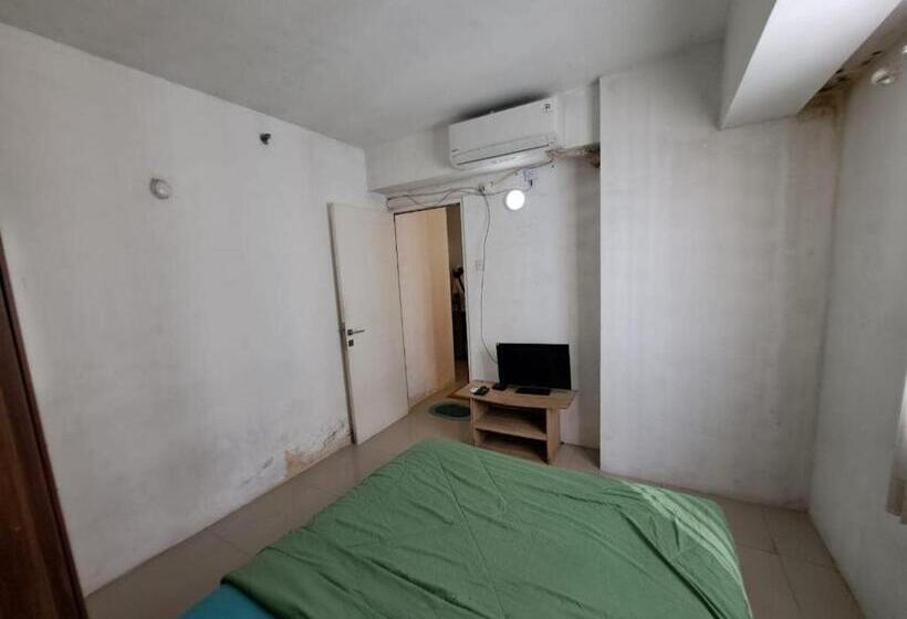 Отель Oyo Life 93106 Apartement Grand Sentraland By Andi