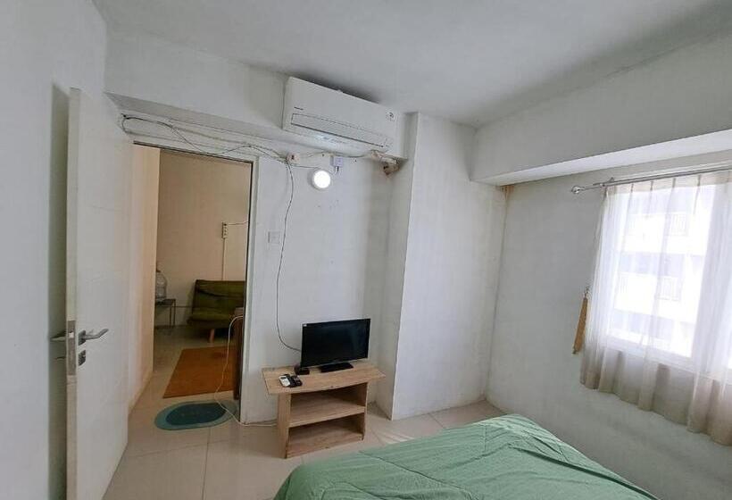 Отель Oyo Life 93106 Apartement Grand Sentraland By Andi