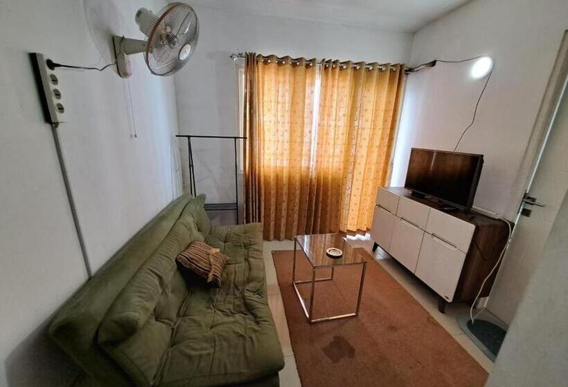 Отель Oyo Life 93106 Apartement Grand Sentraland By Andi