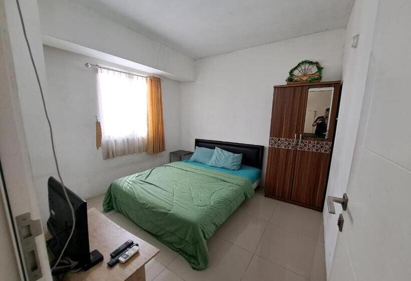 Отель Oyo Life 93106 Apartement Grand Sentraland By Andi