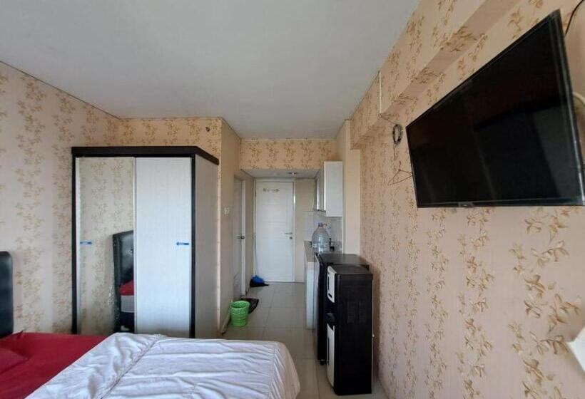 Отель Oyo Life 93106 Apartement Grand Sentraland By Andi