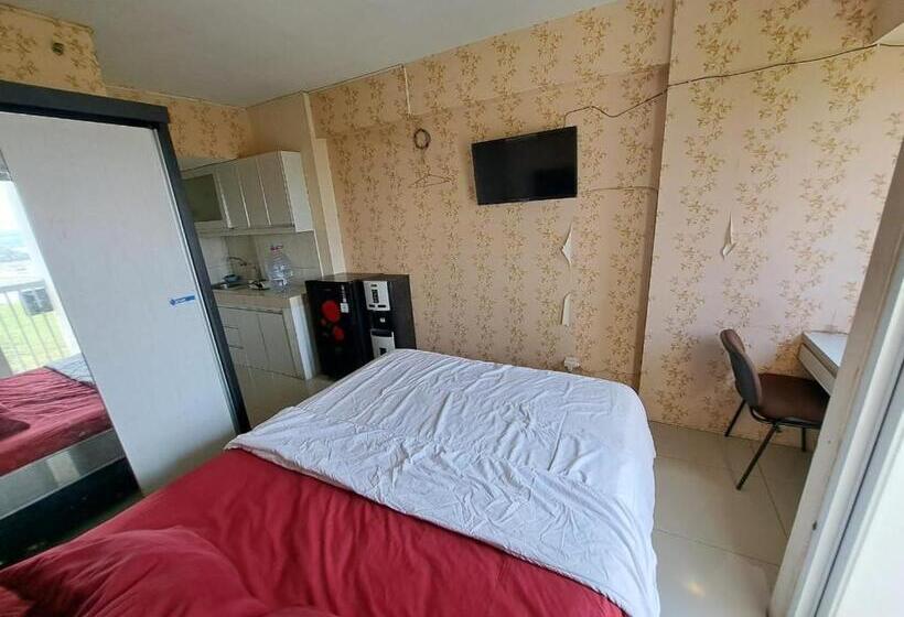 Отель Oyo Life 93106 Apartement Grand Sentraland By Andi