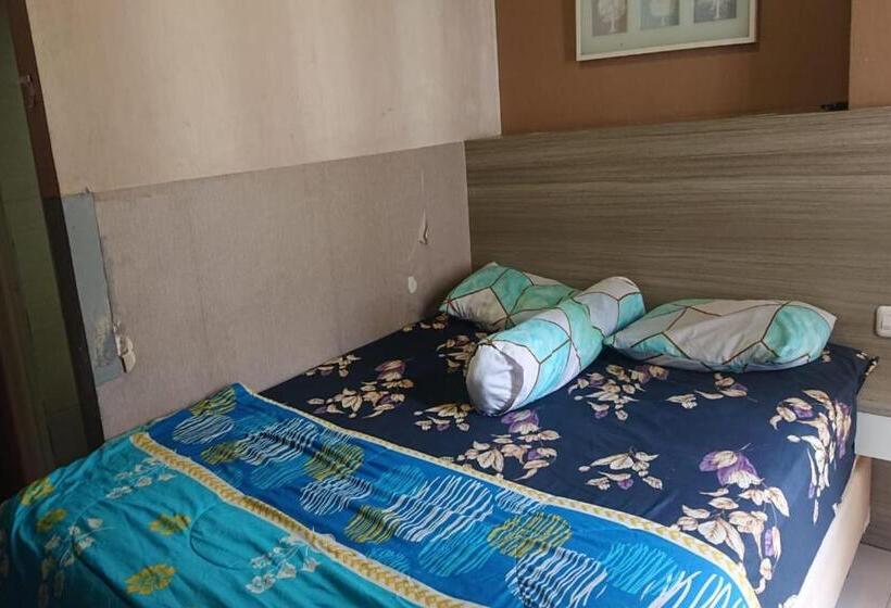 ホテル Oyo Life 93139 Apartemen Grand Sentraland By Evi