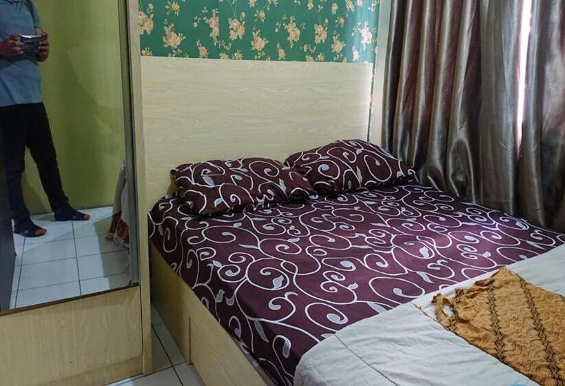 ホテル Oyo Life 93139 Apartemen Grand Sentraland By Evi