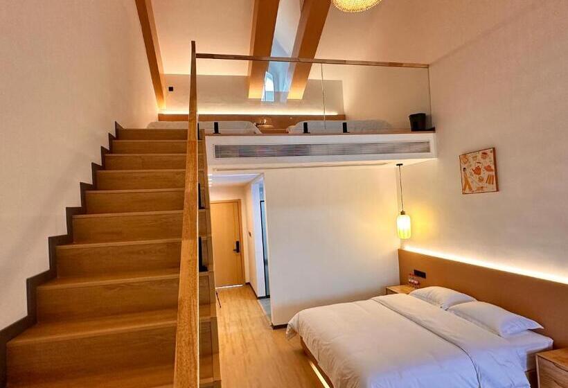 فندق Slowdown Hostel Wulong