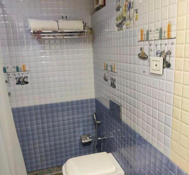 호텔 Spot On Cochin Tourist Home