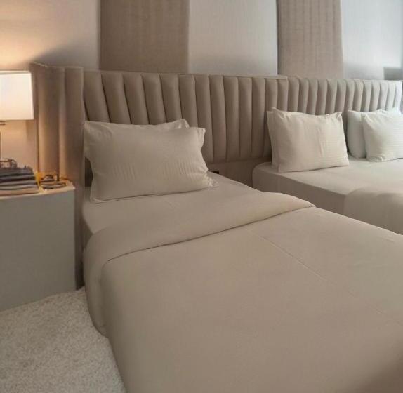 The Queen Airport Hotel Round Trip Airport Service