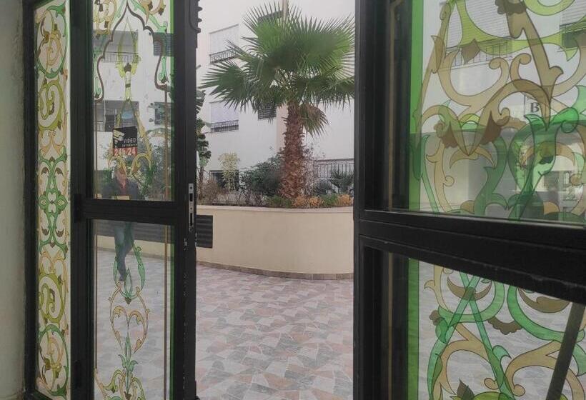 پانسیون Room In Apartment Refined Elegance Cite Les Palmiers