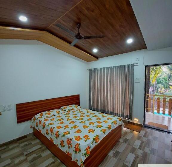 בית מלון כפרי Coconut Garden Beach House