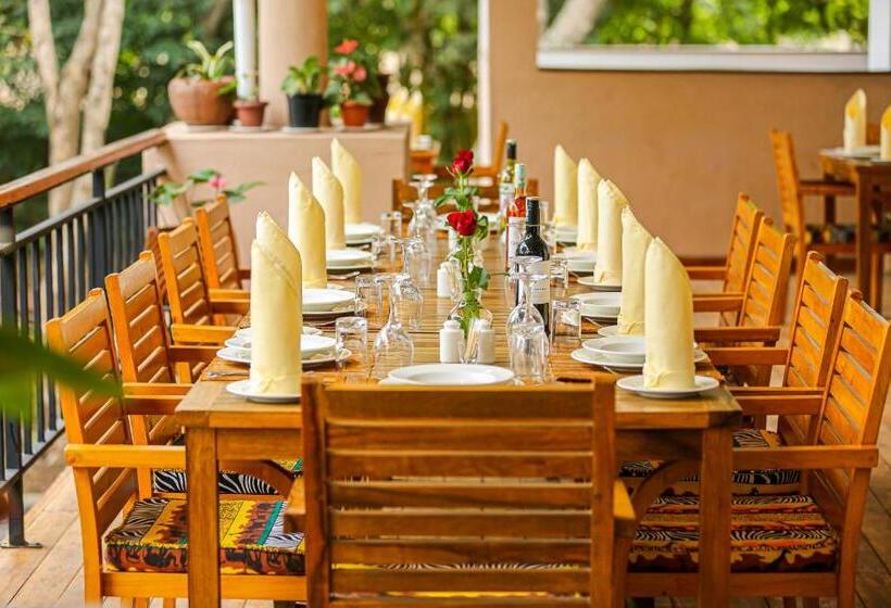 Отель Mbugwe Lodge