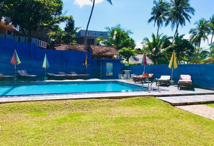 호텔 Moon Bridge Beach Resort