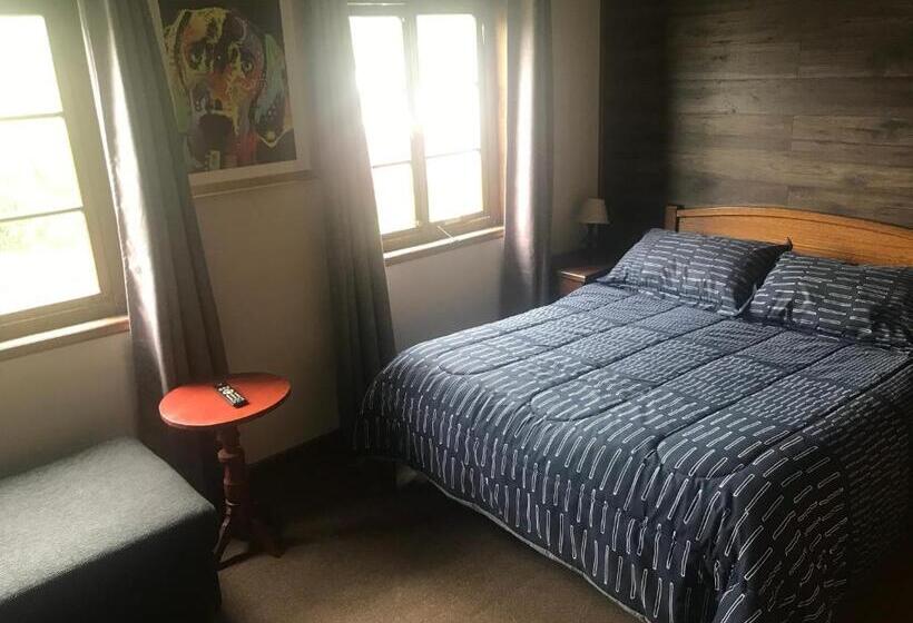 ペンション Hostal Y Cabañas Villa Germana