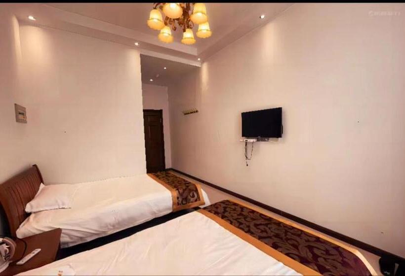 Yabuli Qingyun County Xin Ding Apartment