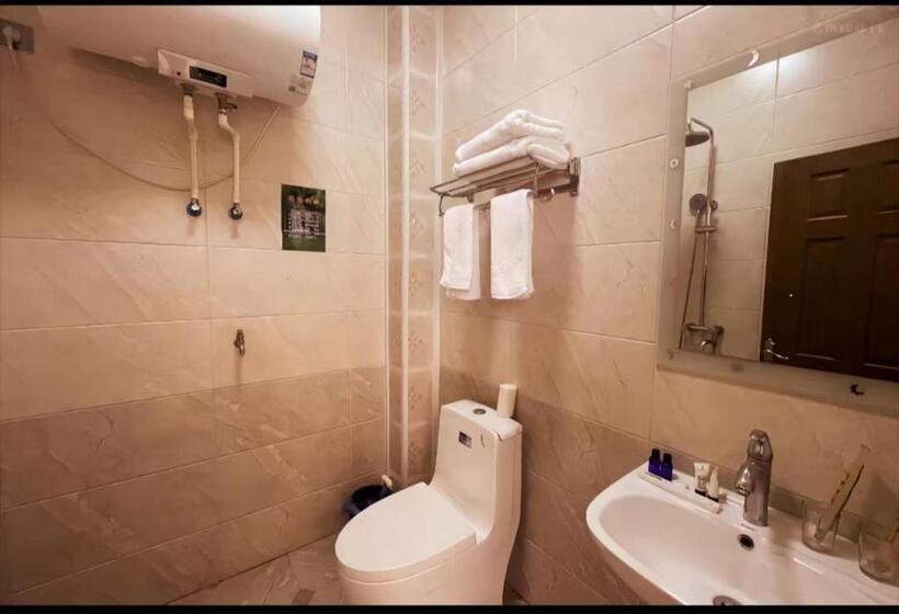 Yabuli Qingyun County Xin Ding Apartment