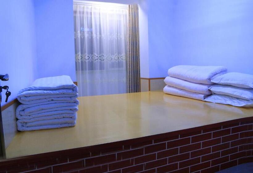 Yabuli Qingyun County Xin Ding Apartment