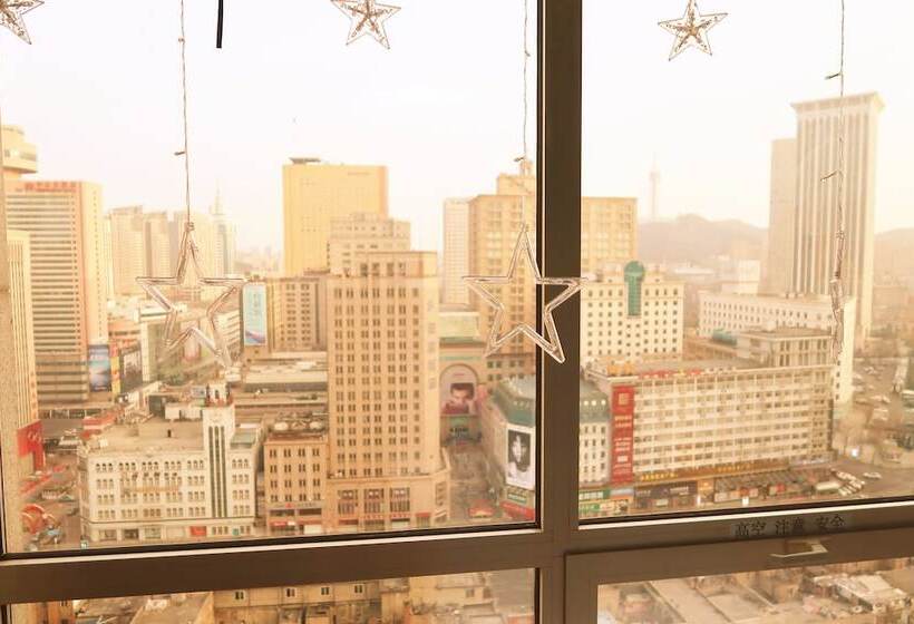 Отель Dalian Venus Apartment