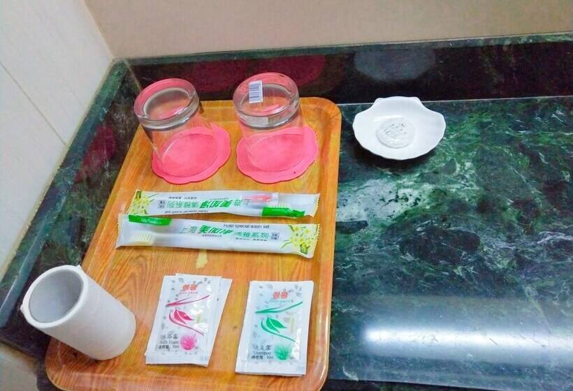 Отель Dalian Venus Apartment