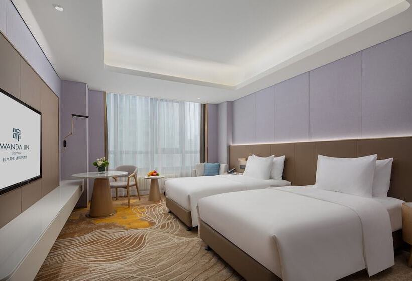 Отель Wanda Jin Jiamusi