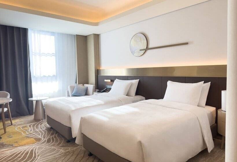 Отель Wanda Jin Jiamusi