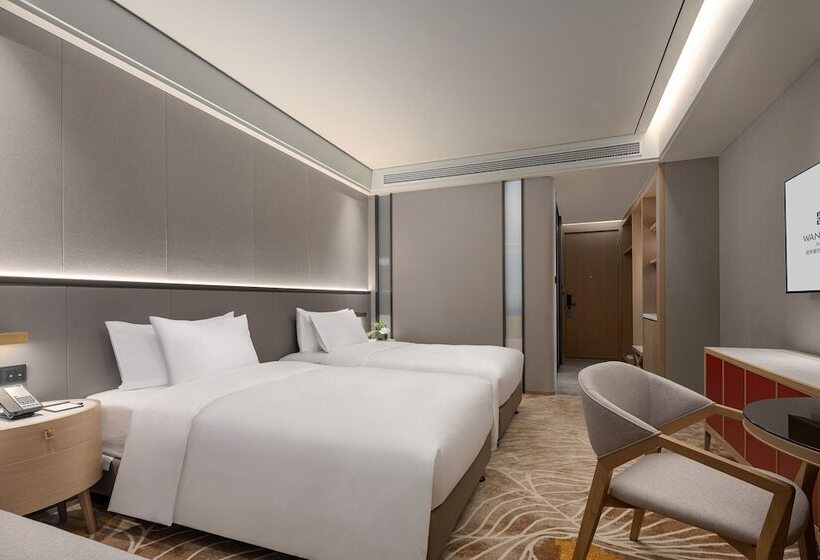 Отель Wanda Jin Jiamusi