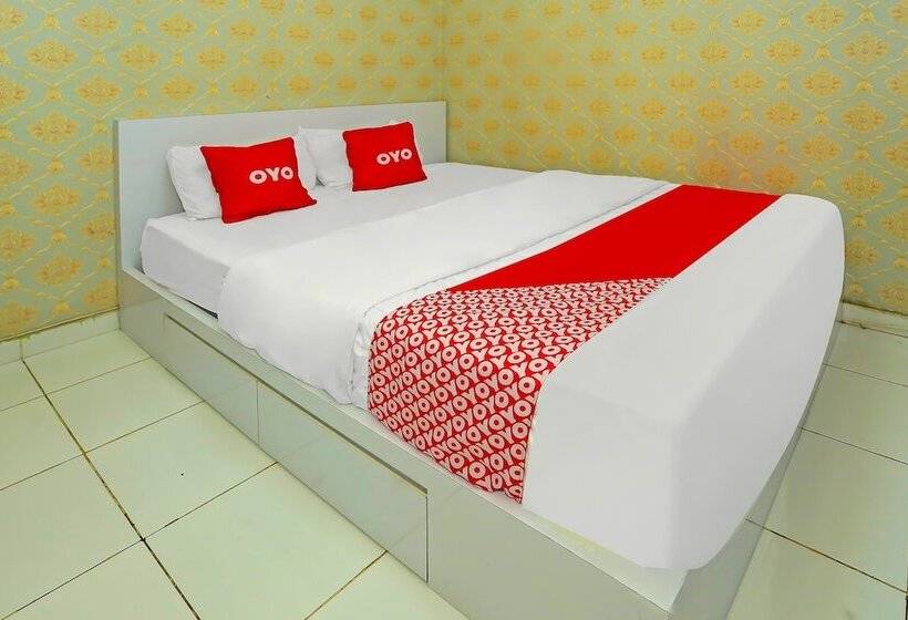 Отель Capital O 92306 Barata Inn