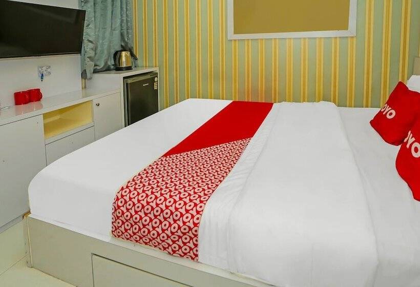 Отель Capital O 92306 Barata Inn