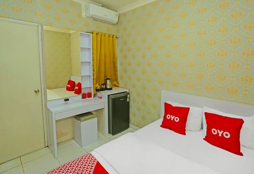 Отель Capital O 92306 Barata Inn