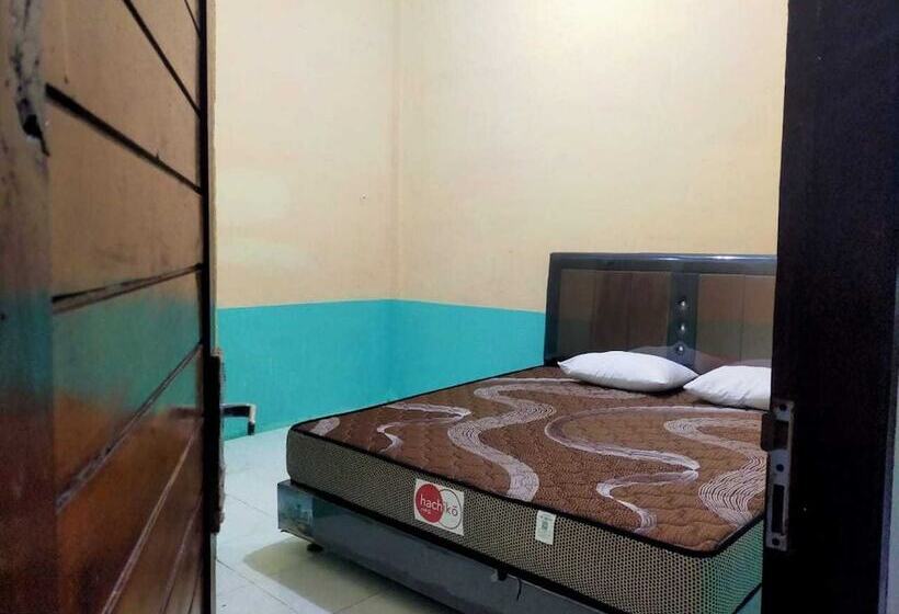 בית מלון כפרי Express O 91938 Grace Kost & Hostel