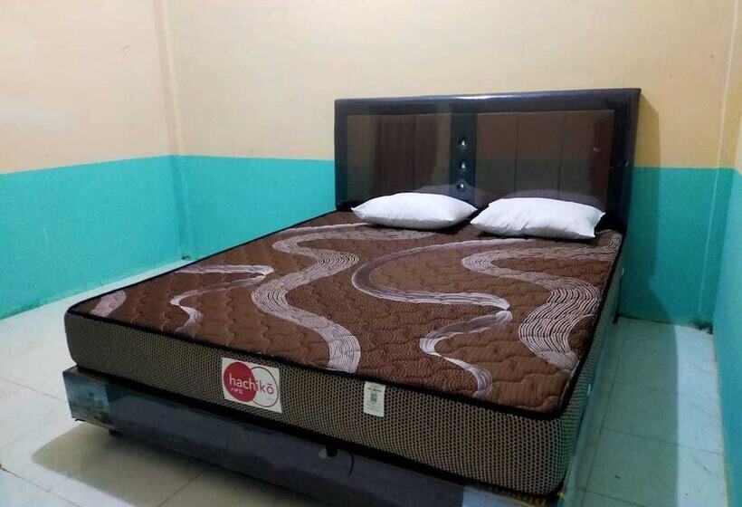 בית מלון כפרי Express O 91938 Grace Kost & Hostel