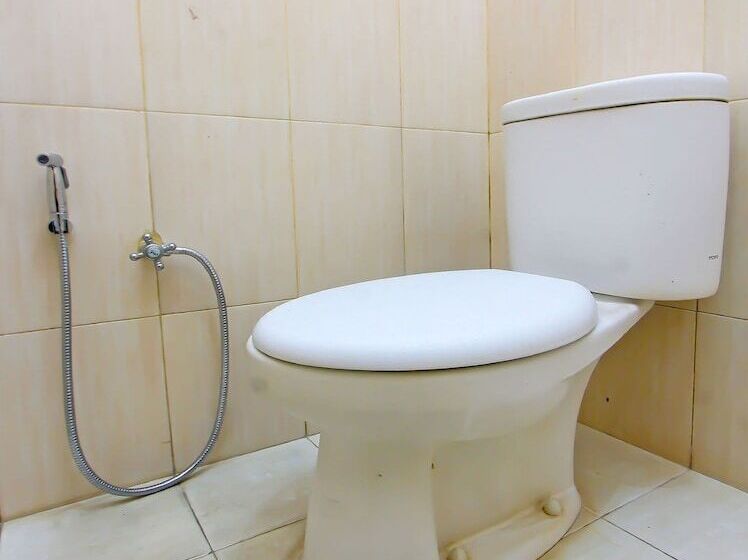 Отель Kemuning Guesthouse By Oyo