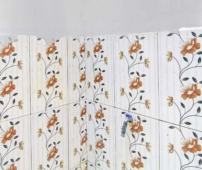 בית מלון כפרי Spot On 92281 Susupuan Kostneartaman Deki Lestari