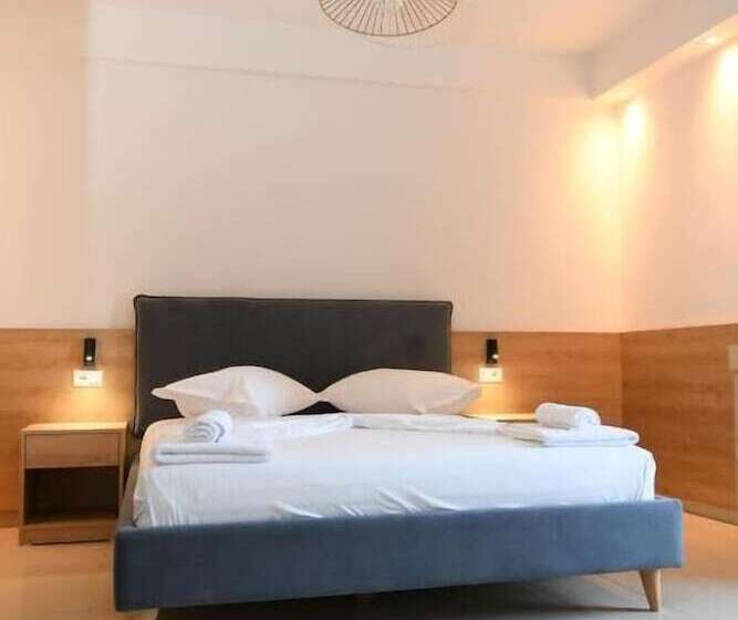 בית מלון כפרי Village By The Sea